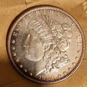 57_a7051085-b1a9-445b-a3d8-810df6e7f54c.jpg 1884 U S Silver Morgan Dollar $1 Coin 90% Silver Bright Frosty Luster VF