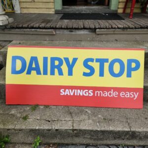 Vintage Dairy Stop Saving Made Easy Sign