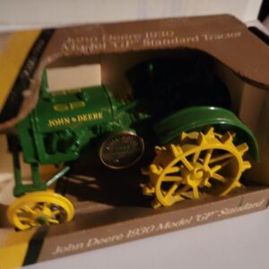 57_cdb80a3b-56c2-4ac4-9aa9-b167c0da49cd.jpg Ertl 1:16 John Deere 1930 Model GP Standard Tractor 5801