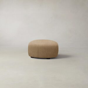 chelsea-ottoman_tuscan-leather-camel_charcoal_round2.0.jpg The Chelsea Ottoman - Tuscan Leather Camel